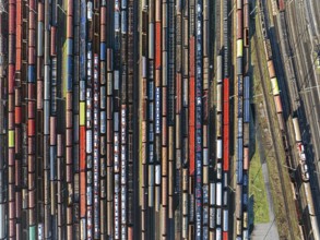 Mannheim marshalling yard. There are many freight trains and freight wagons on the tracks. aerial