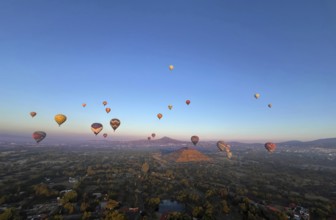 Panoramic aerial view of Mexico Teotihuacan pyramids. Hot air balloons flying over the Mexican