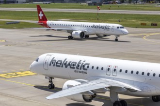 Embraer 195 E2 Helvetic Airways aircraft with the HB-AZI license plate at Zurich Airport,