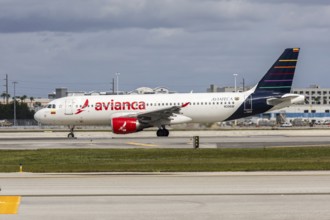 An Avianca Airbus A320 aircraft with the license plate N398AV and the AVIATECA retro special paint