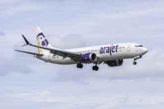 An Arajet Boeing 737-8 MAX aircraft with license plate HI1081 at Miami airport, USA