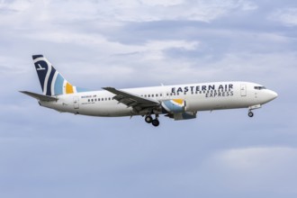 An Eastern Air Express Boeing 737-400 aircraft with license plate N438US at Miami airport, USA