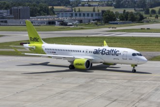 An Airbus A220-300 Air Baltic aircraft with the license plate YL-ABJ at Zurich Airport, Switzerland