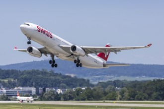 A Swiss Airbus A330-300 aircraft with the HB-JHH license plate at Zurich Airport, Switzerland