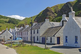 White houses at the foot of hills in a picturesque village, Local Hero, Pennan, Aberdeenshire,