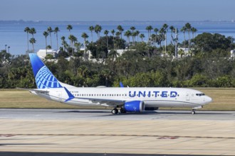 A United Airlines Boeing 737 MAX 8 aircraft with license plate N17296 at Tampa airport, USA