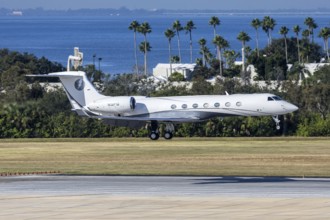 A Gulfstream G550 private jet aircraft with license plate N5PD at Tampa airport, USA