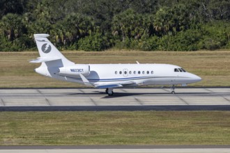A LJ Aviation Dassault Falcon 2000EX private jet aircraft with license plate N623CT at Tampa
