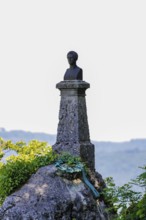 Wilhelm Hauff monument, rocks above the Echaz Valley, monument from 1839, obelisk with bronze bust,