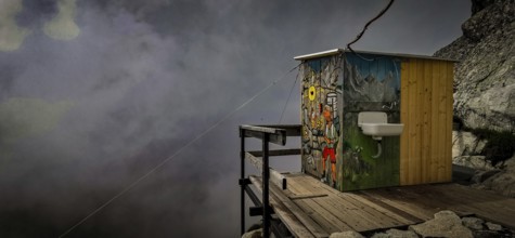 Colourful toilet of the Chata pod Rysmi mountain hut on a wooden platform in the middle of a