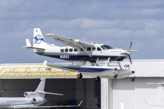 A Tropic Ocean Airways Cessna 208B Grand Caravan EX aircraft with license plate N501EX at Fort