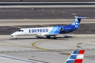 A Contour Airlines Embraer 135 aircraft with license plate N11526 at Phoenix airport, USA