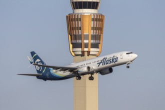 An Alaska Airlines Boeing 737-900ER aircraft with license plate N274AK at Phoenix airport, United