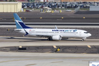 A Westjet Airlines Boeing 737-8 MAX aircraft with the license plate C-GRAX at Phoenix airport, USA