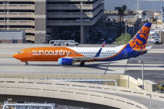 A Sun Country Airlines Boeing 737-800 aircraft with license plate N838SY at Phoenix airport, United
