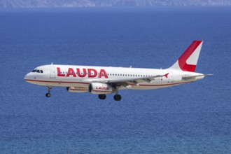 A Lauda Europe Airbus A320 aircraft with the license plate 9H-LOM at Rhodes airport, Greece