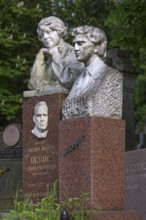 Busts on a grave, Lützenhofer cemetery Lychakivskiy cemetery, Lviv, Galicia, Ukraine