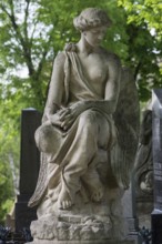 Female sculpture, hands folded, Lützenhofer cemetery Lychakivsky cemetery, Lviv, Galicia, Ukraine