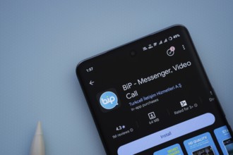 Dhaka, Bangladesh- 29 May 2025: On a blue surface, a smartphone displays the Bip app within the