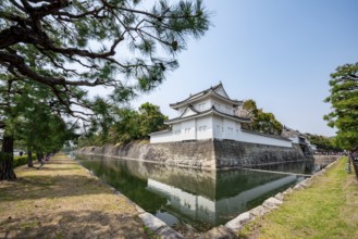 Tonan Sumi-yagura, southeastern watchtower, reflected in the water of the moat, former imperial