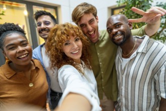 Happy business colleagues enjoying teamwork and a moment together, depicting diversity and