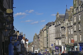 A street with Georgian buildings under a clear blue sky, Royal Mile, Edinburgh, Scotland, United