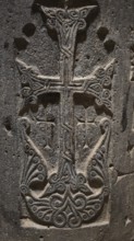 A richly decorated stone cross with complex reliefs and engravings, Orthodox, Armenia