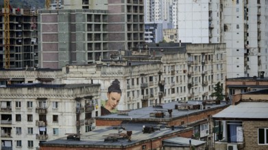Building with a large mural in an urban environment, Tbilisi, Georgia