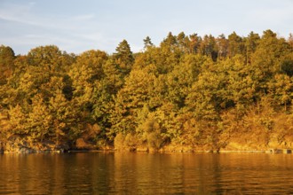 Brno Reservoir (Brnenská prehrada) on the Svratka River on a sunny autumn day. The reservoir is
