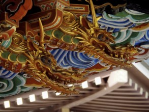 Close-up view of golden dragon sculptures with vivid colors, Narita-san Temple, Narita, Japan