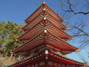 Close-up view of a multi-storey pagoda with blue sky in the background, Chureito Pagoda,