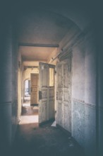 Corridor of an abandoned administration building in the light of the evening sun, Lost Place,