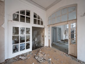 Staircase of an abandoned administration building full of rubble and shards, Lost Place,