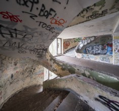 Dilapidated stairwell full of graffiti in a former FDGB holiday home, Lost Place, Saxony-Anhalt,