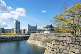 Osaka Castle Wall Watch Tower, Moat Park with Water, Skyscrapers in the Back, Chuo-ku, Osaka, Japan