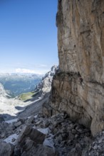 Mountaineers on the Bocchette Centrale band trail, via ferrata in the Brenta Mountains,