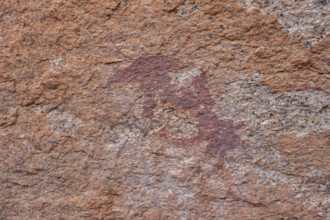 Bushman's paradise, prehistoric rock carving on orange rock, Spitzkoppe, Namibia