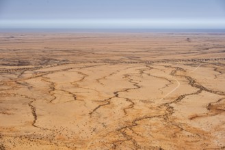 Aerial view of a dry desert with clearly structured landscapes, Spitzkoppe, Namibia