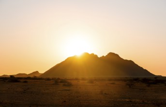 Spitzkoppe silhouette at sunset, orange sky, Spitzkoppe, Namibia