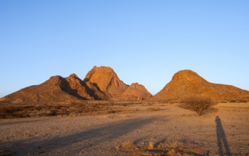 Distant view of the vast desert landscape of Spitzkoppe, Spitzkoppe, Namibia