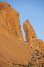 Tall orange rock formations rise majestically, Spitzkoppe, Namibia