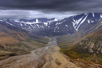 Aerial view over Adventdalen in summer, 30-kilometre valley and river Adventdalselva on the island