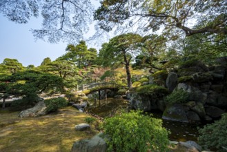Gonaitei Garden with Dobashi Bridge over a pond, Japanese Garden, Kyoto Imperial Palace, Kyoto,