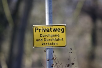 Privatweg, sign, prohibition, A yellow sign with the words Durchgang und Durchfahrt verboten