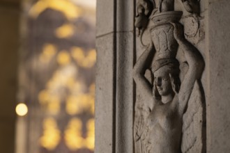 Decorative bas-relief depicting woman wearing vase on her head, Royal Academy of Arts, Art Gallery