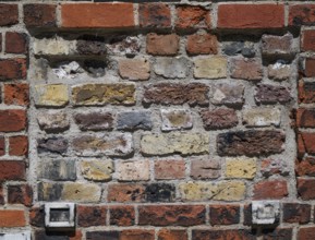Weathered brick wall in various shades and structures, London, England, Great Britain