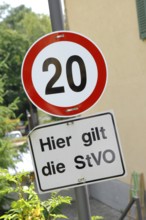 Traffic sign maximum speed 20 km/h with additional sign