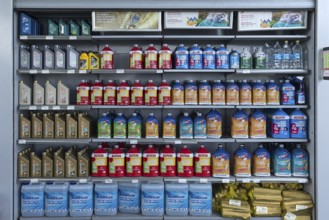 Sales rack with motor oil at a gas station, Bulgaria