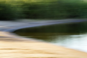 Riverbank with beach, minimalistic presentation, evening light, mopping effect, Lower Saxony Elbe