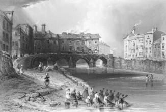 Bridge over the Shannon River in Limerick, woman fishing, Province of Munster, Ireland, city scene,